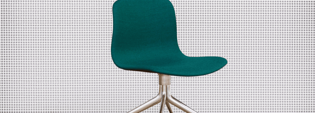 HAY AAC 15 chair in teal with a swivel base.