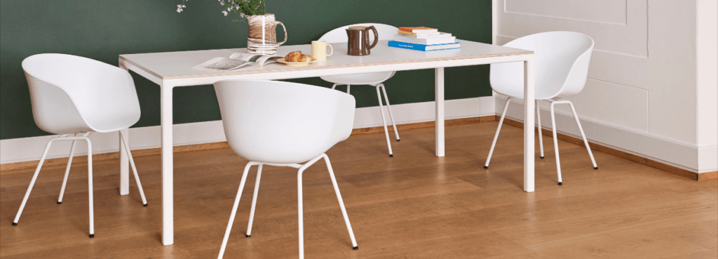 HAY AAC 26 chair. White shell chair with a bent steel base. Modern design.