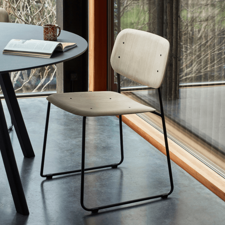 HAY Soft Edge 50 chair. Wood seat/back, black steel base. Modern, stackable design for Cyprus homes.