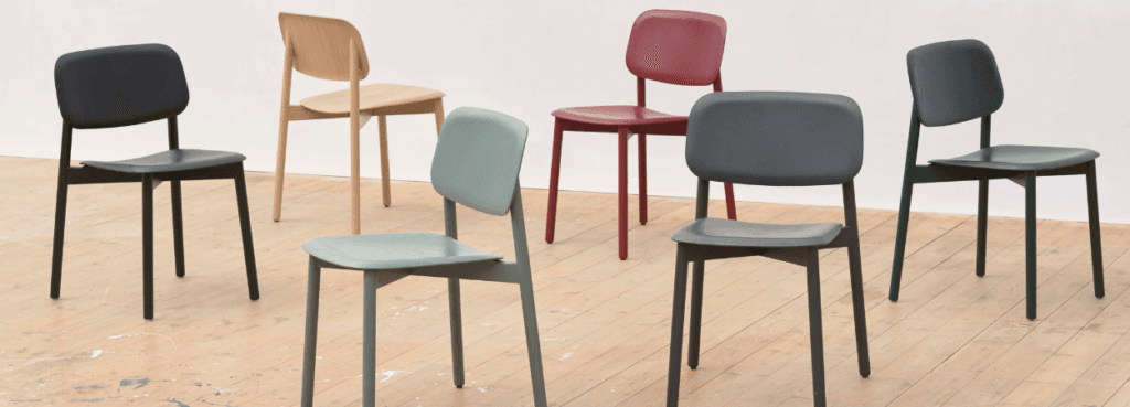 HAY Soft Edge 60 chairs in wood and colorful molded veneer. Modern, stackable design for Cyprus homes.