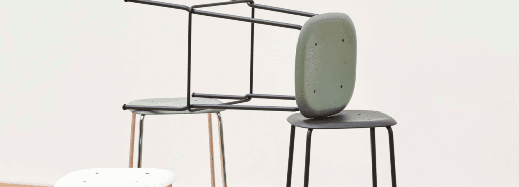 HAY Soft Edge 85 stool. Stackable design with steel legs and a molded plastic seat. Modern seating for bars and social spaces.