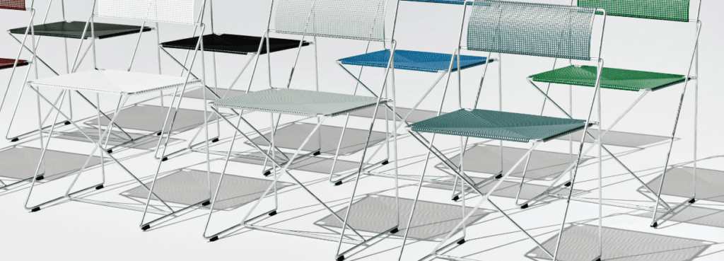 HAY X-Line Chair Chrome, a stackable, minimalist chair with a distinctive X-structure, in various colors.