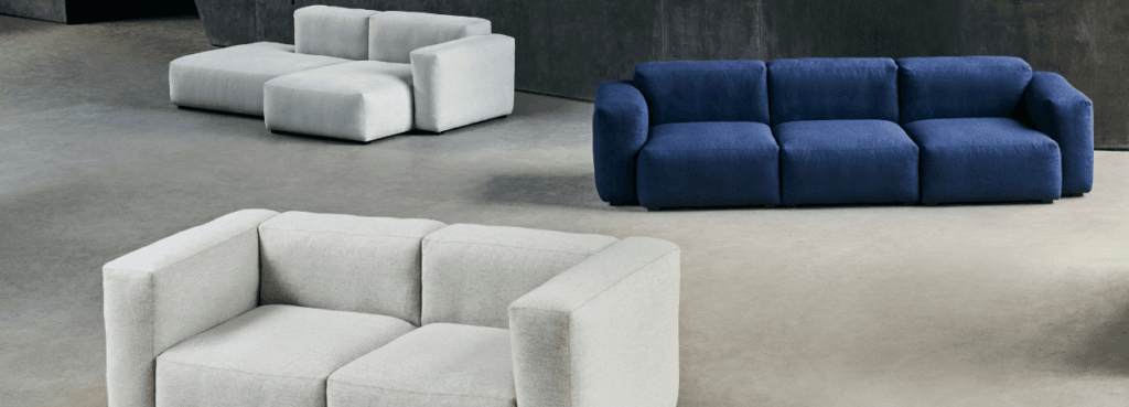 HAY Mags Soft Low Armrest Sofa in blue and light gray, modular seating for living or office spaces.