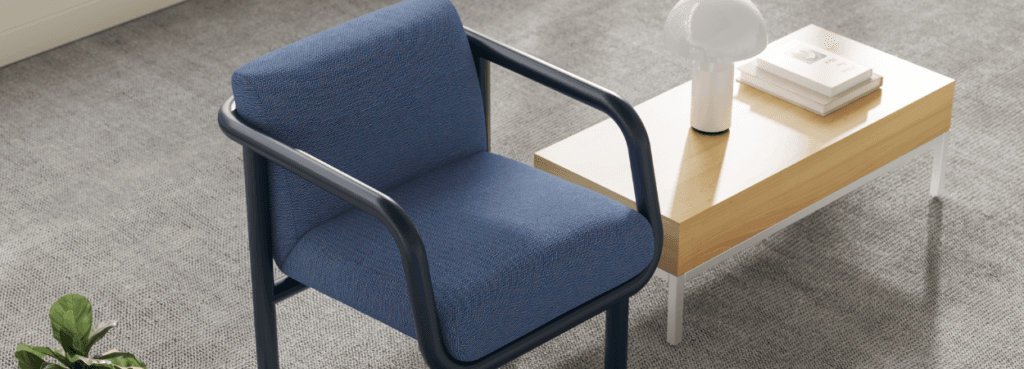 NaughtOne Percy Lounge Chair in blue fabric with a black tubular frame. Modern design.
