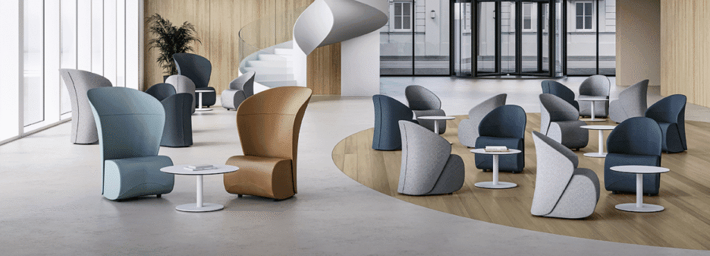 KOCCOLA armchair in a waiting area. Modern design with various colors and styles. Social and relaxed spaces.