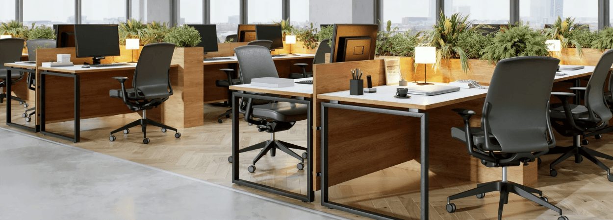 Office space featuring Fit-Out and Turnkey Solutions in Cyprus. Modern desks, ergonomic chairs, and greenery. Product-Hero-1024x369.png