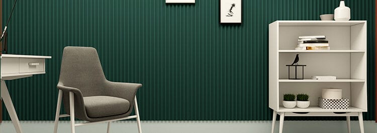 Modern workspace featuring green acoustic panels, chair, desk, and bookshelf.