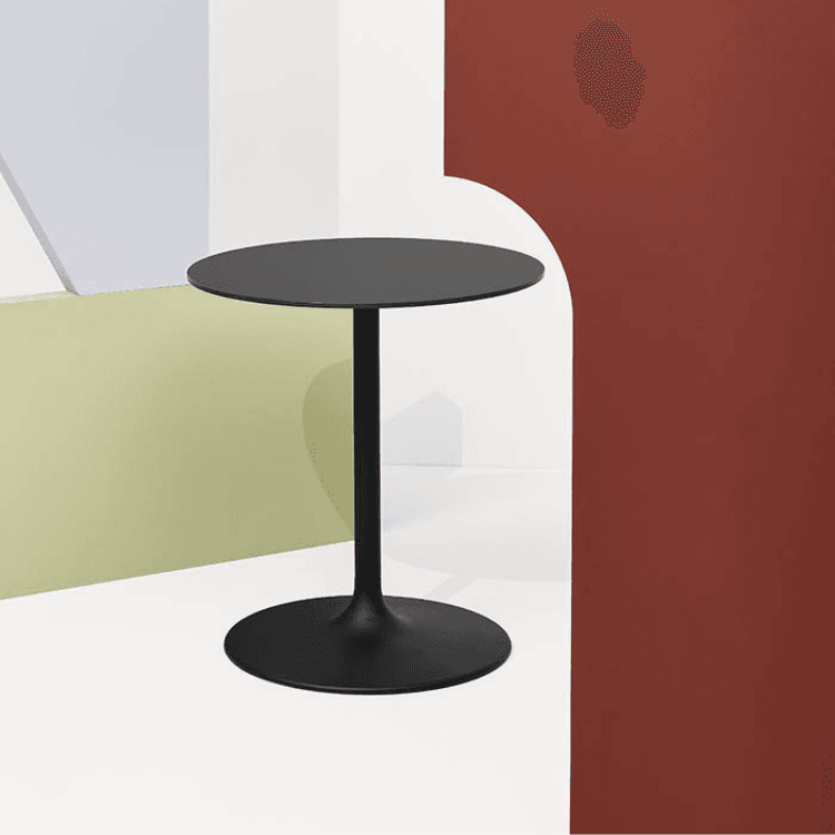 Minimalist black Flink Table by Infiniti. Painted steel, round base. Ideal for bistros and outdoor spaces.