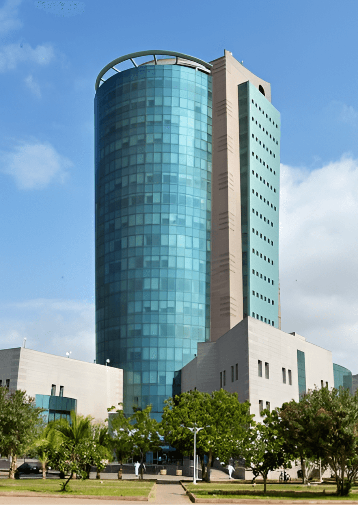 Jazan University, Saudi Arabia: Modern architecture featuring a cylindrical glass tower and surrounding buildings.