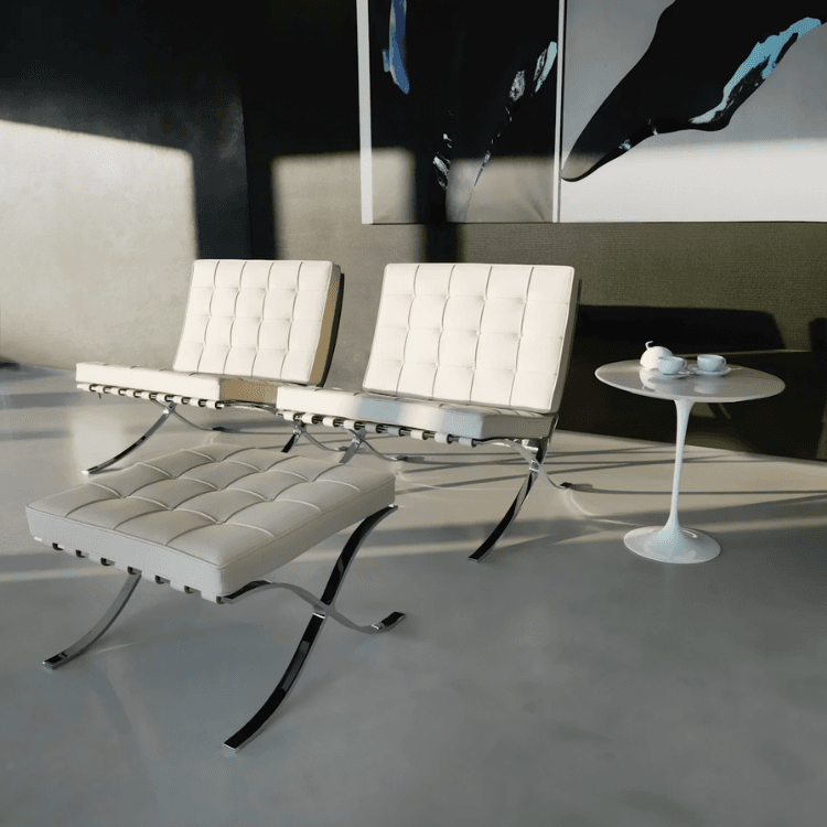 Barcelona Stool with white tufted leather cushion and polished chrome frame in a modern interior setting.