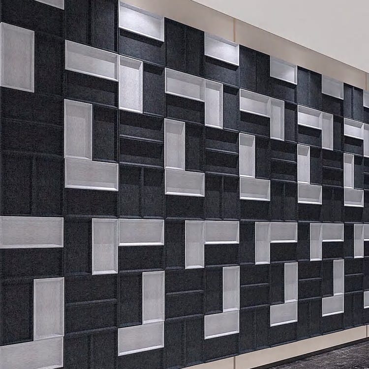 Dark charcoal and light grey Brick Mosaic acoustic wall tiles creating a geometric 3D masonry effect.