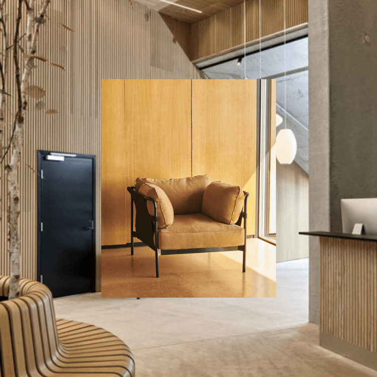 CAN 1 Seater armchair with a soft tan upholstered seat and a sleek black frame in a modern interior setting.