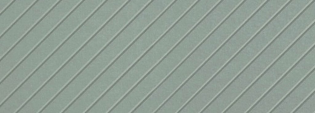 Sage green Chevron Carved Acoustic Panel featuring diagonal grooved patterns on a soft PET felt surface.