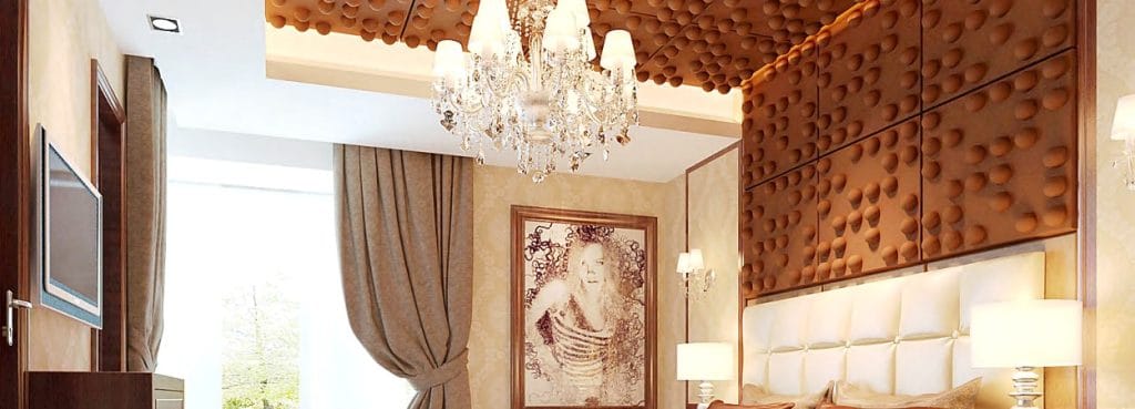Da Vinci Code 3D acoustic felt wall panels with a grid of recessed half-sphere dimples in a warm brown tone.