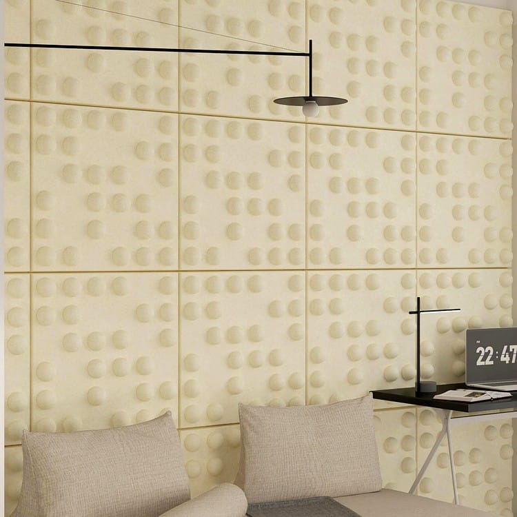Da Vinci Code acoustic panels featuring a cream-colored grid of 3D hemispherical textures on a modern felt surface.