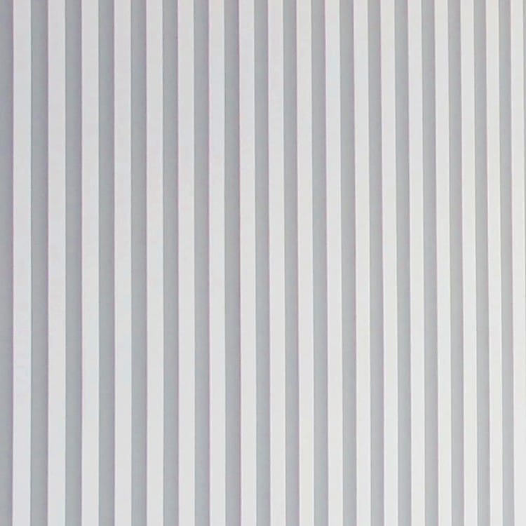 A full-frame view of a light gray Fine Reeded Acoustic Panel displaying deep, rhythmic vertical channels and textures.