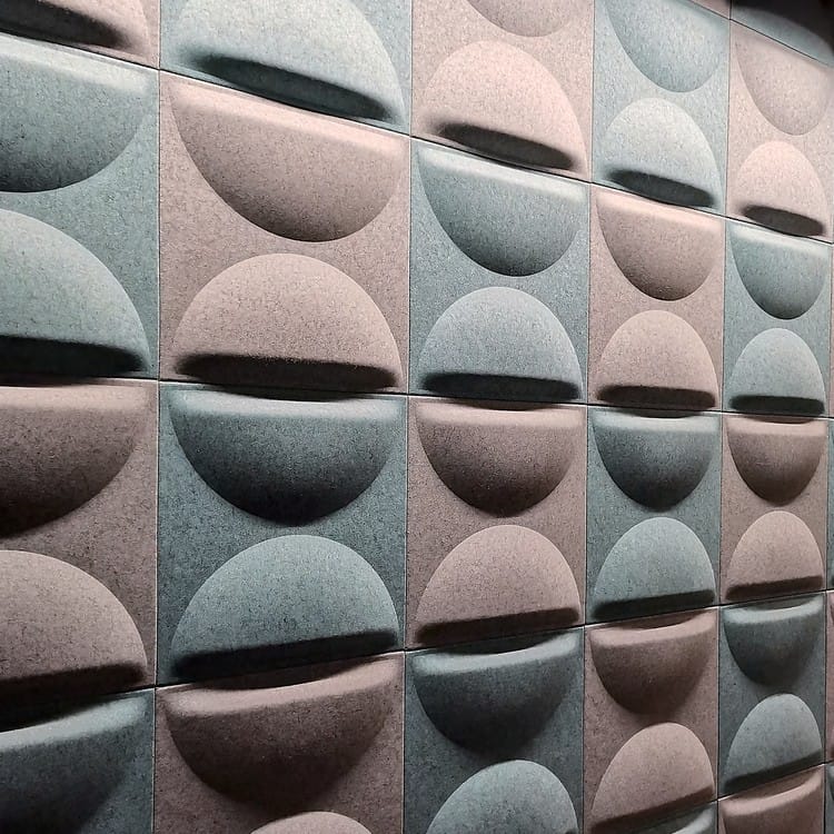 Harmony Duo acoustic wall featuring a repeating pattern of raised and inset semicircular PET felt shapes in blue-grey.