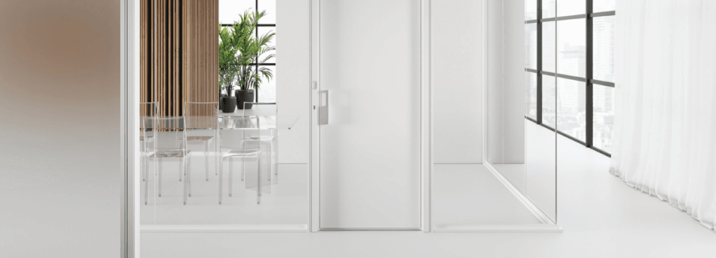 Infinity partition featuring a solid white door centered between clear glass panels and textured wood accents.