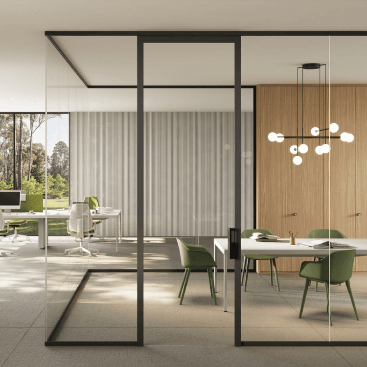 Minimalist Mood M1 glass partition with sleek black frames separating a bright, modern office meeting area.