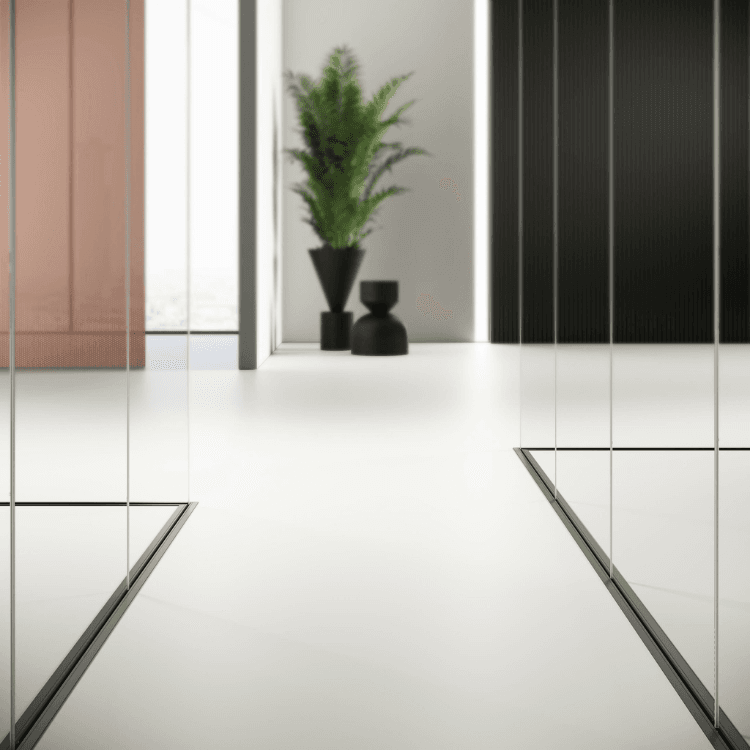Mood MN single-glazing glass partition with slim profiles in a modern interior with minimal decor.