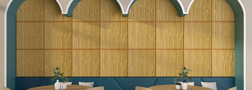 Organ Flow acoustic wall panels in golden PET felt with a vertical reed design inside an arched interior space.