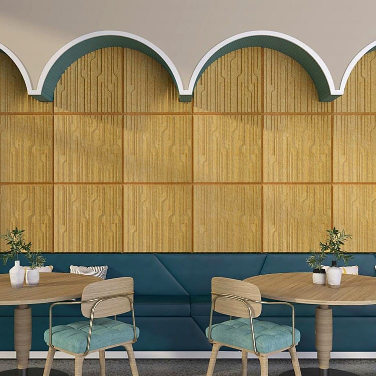 Organ Flow felt panels in warm mustard tones arranged in a grid pattern beneath white arched architectural ceiling trim.
