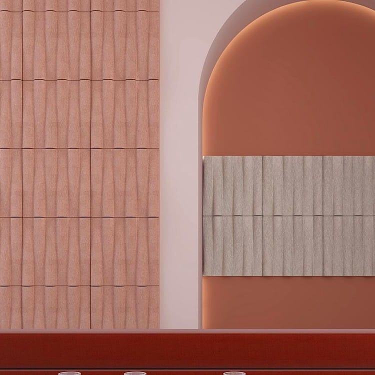 Precision Weave panels with soft sculpted PET felt curves in muted pink and warm gray tones mounted on an arched wall.