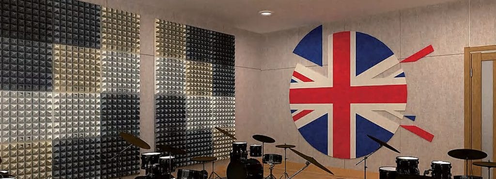 A studio wall featuring repeating Pyramid acoustic panels in a mix of grey and beige tones for sound absorption.