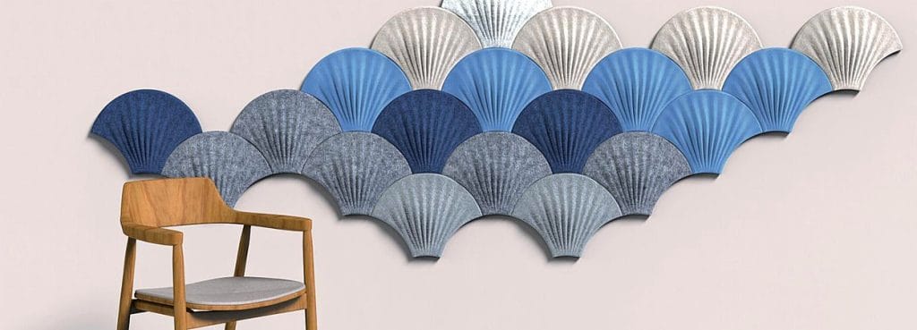 Seashell Ripple acoustic wall panels in a blue and grey scallop pattern made of 3D textured PET felt.