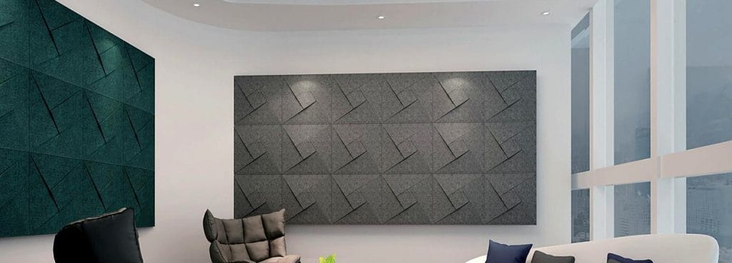 Spin Square acoustic panels featuring grey felt with geometric pinwheel facets mounted on a modern office wall.
