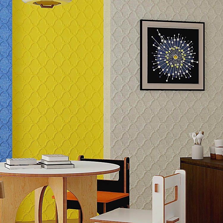 Starshield embossed PET felt tiles in vibrant yellow and neutral beige with a classic quatrefoil lattice wall design.
