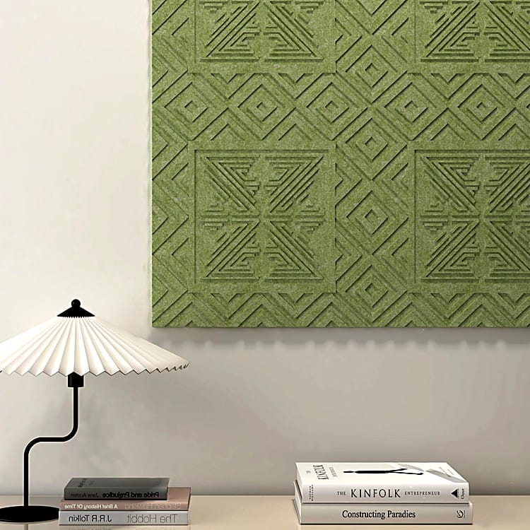 Olive green Tang Dynasty acoustic felt panels with geometric embossed patterns mounted on a minimalist office wall.