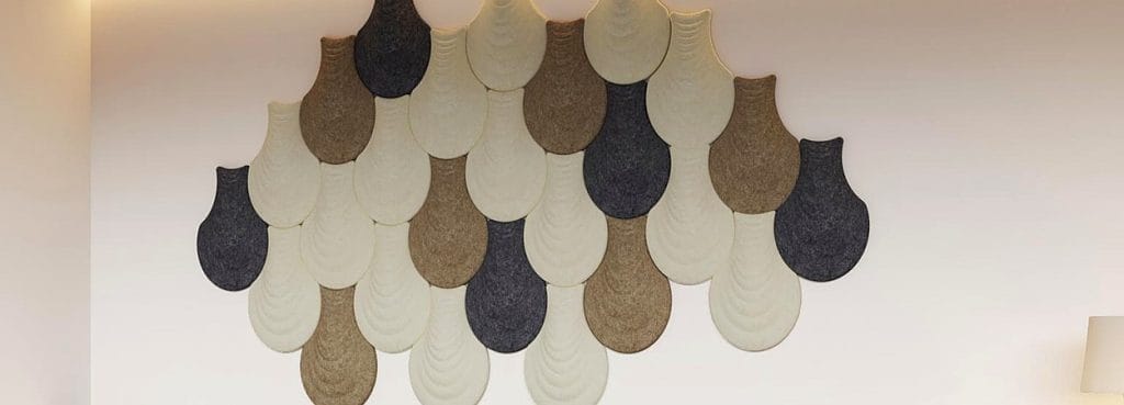 Vase Form PET felt acoustic wall panels in a decorative ribbed silhouette with white, grey, and brown earth tones.