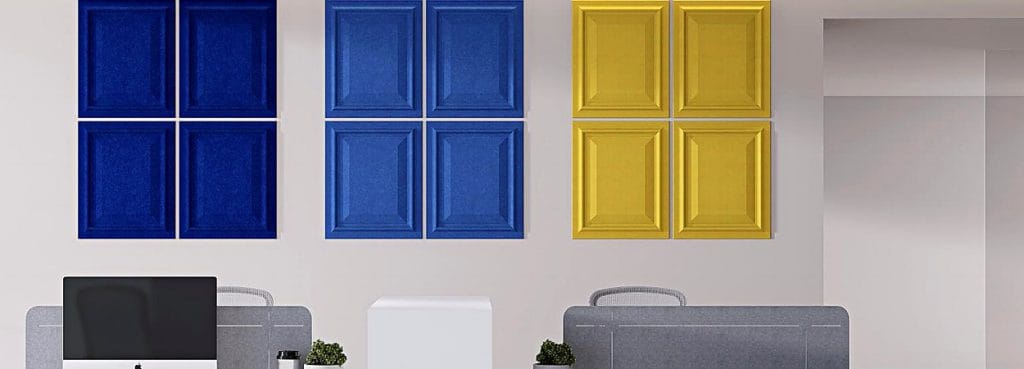 Wall Guard acoustic panels with classic raised-and-fielded wainscot design in vibrant blue and yellow PET felt.