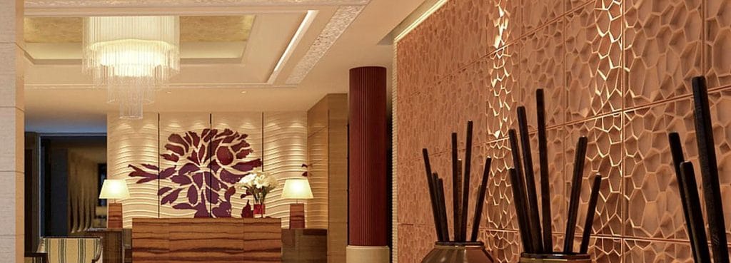 Water Cube acoustic panels featuring an organic cellular bubble relief pattern on a modern interior wall.