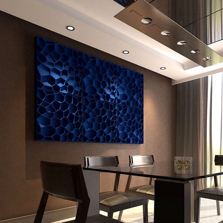 Deep blue Water Cube PET felt panels arranged in a hexagonal 3D lattice pattern on a dark dining room wall.