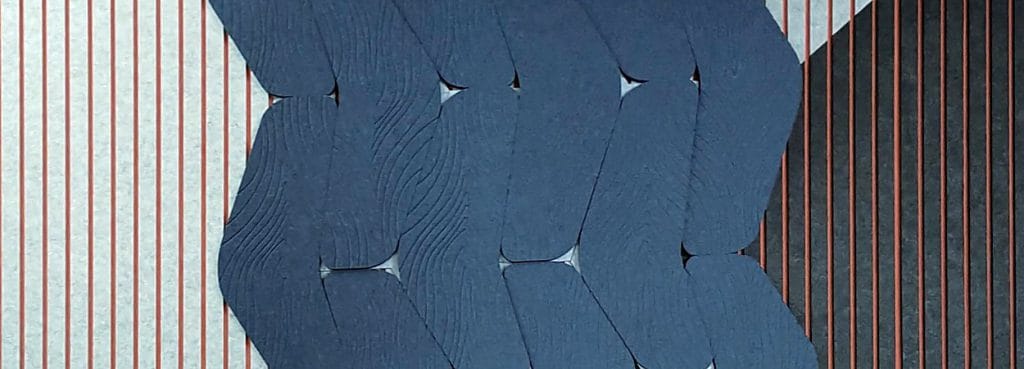 Wide Slat Acoustic Panel featuring vertical slats and dark blue textured felt geometric shapes on a wall.