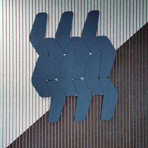 Wide Slat Acoustic Panel background with layered, dark blue geometric PET felt shapes in an overlapping pattern.